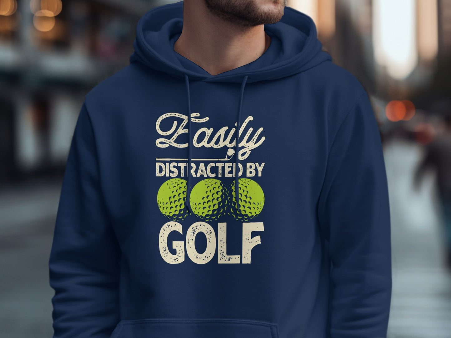 Navy blue hoodie with "Easily Distracted by Golf" text and three golf balls.