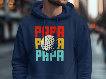 Navy blue hoodie with "PAPA" in red, yellow, and blue, and a golf ball.