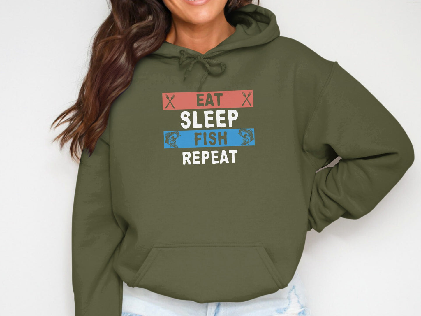 Green hoodie with "EAT SLEEP FISH REPEAT" text and fishing graphics.