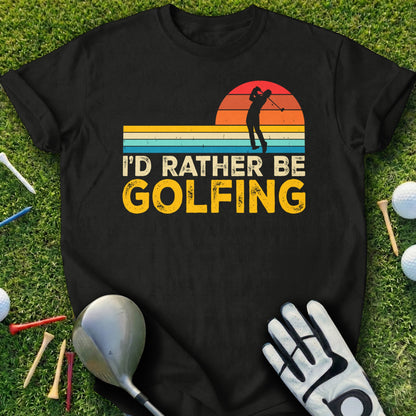 Black t-shirt with "I'D RATHER BE GOLFING" text and a golfer silhouette.
