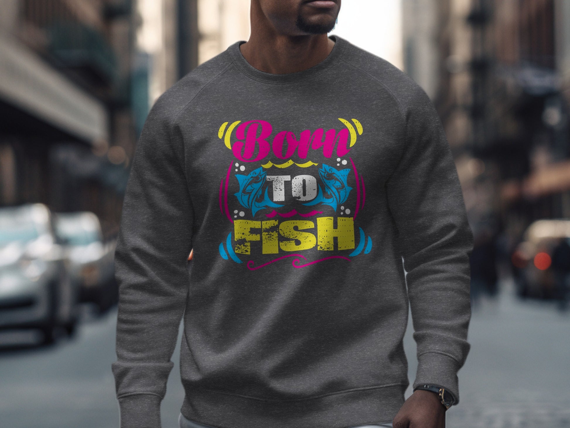 Gray sweatshirt with "Born to Fish" text and fish graphics.