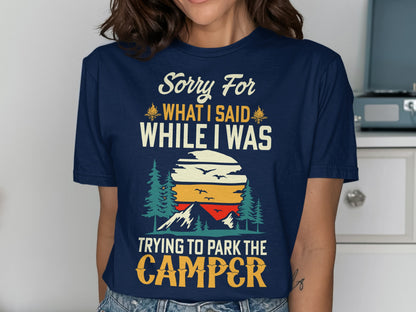 Navy t-shirt with "Sorry For What I Said While I Was Trying to Park the Camper" text and sunset graphic.