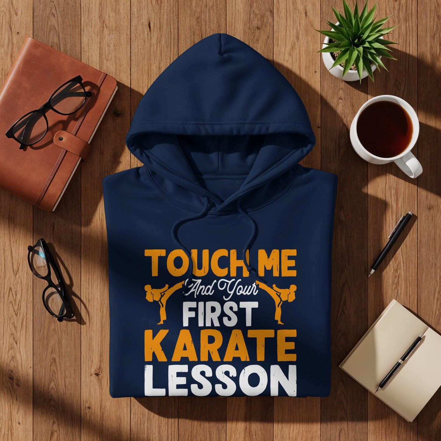 Navy hoodie with "TOUCH ME AND YOUR FIRST KARATE LESSON" text and karate graphic.