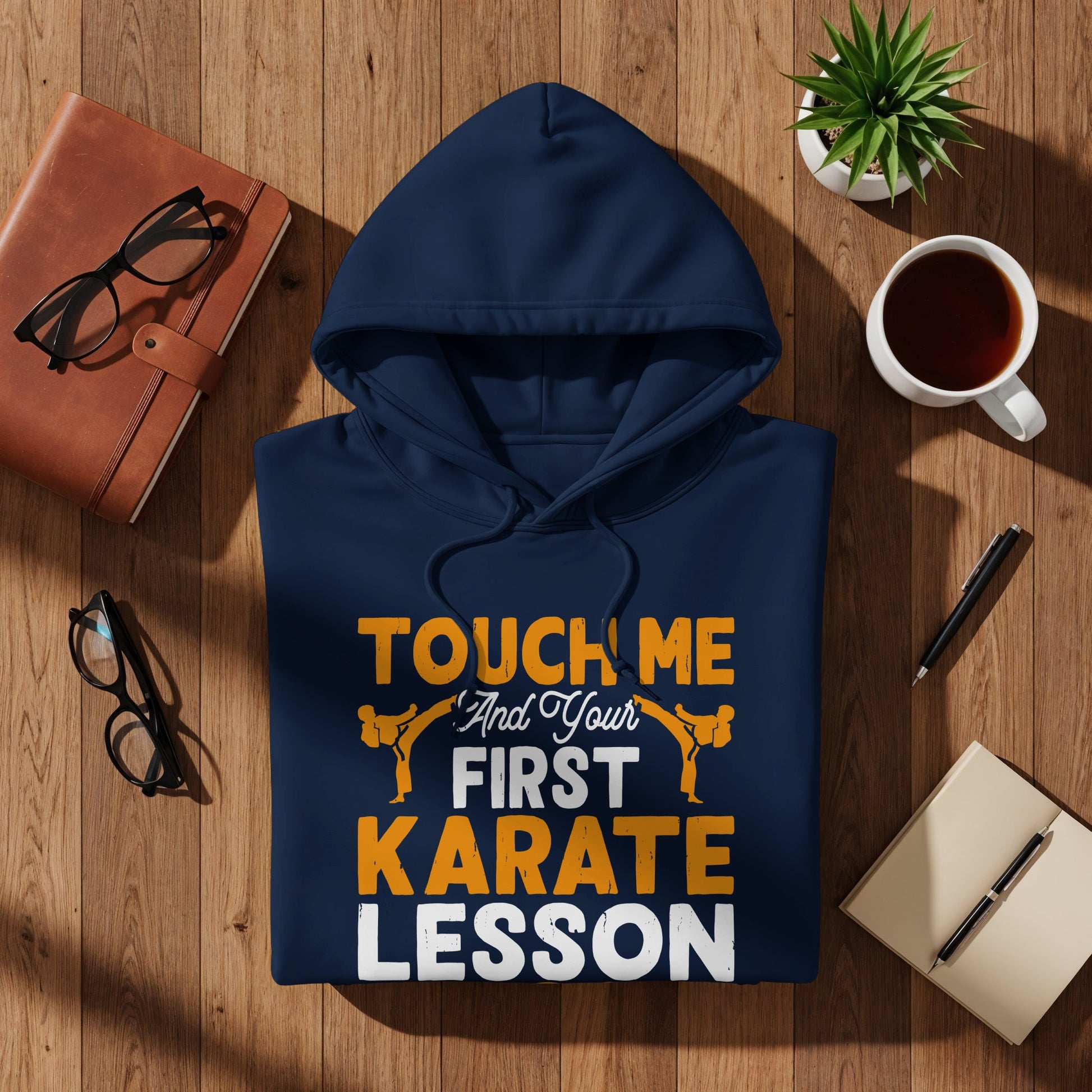 Navy hoodie with "TOUCH ME AND YOUR FIRST KARATE LESSON" text and karate graphic.