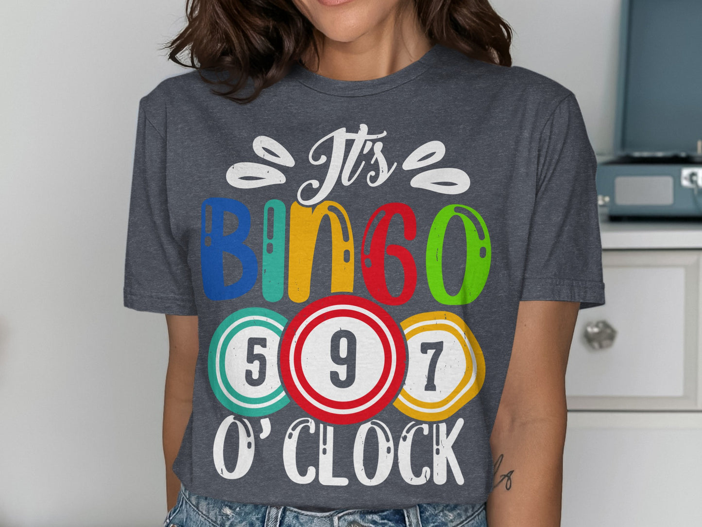 Dark gray t-shirt with "It's Bingo O'Clock" and colorful bingo balls.