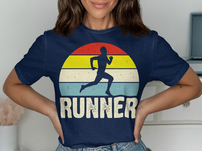 Navy t-shirt with a runner silhouette against a retro striped sunset.