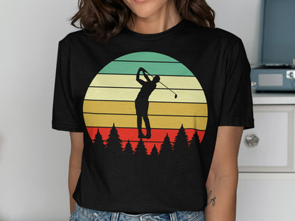 Silhouette of a golfer swinging against a striped sunset over pine trees.