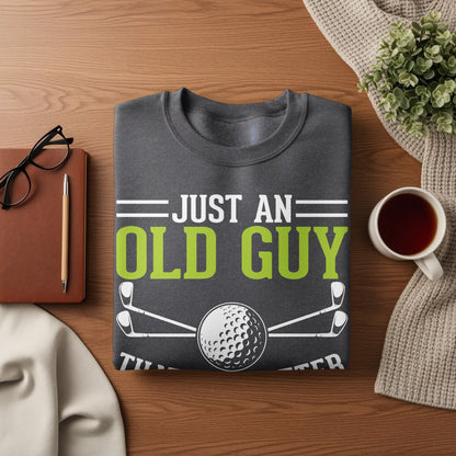 Dark gray sweatshirt with "JUST AN OLD GUY" and golf graphics.