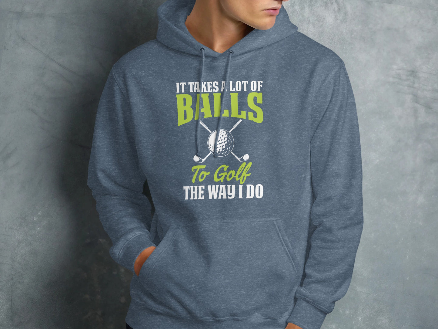 Grey hoodie with "It Takes A Lot Of Balls To Golf The Way I Do" text and golf clubs.