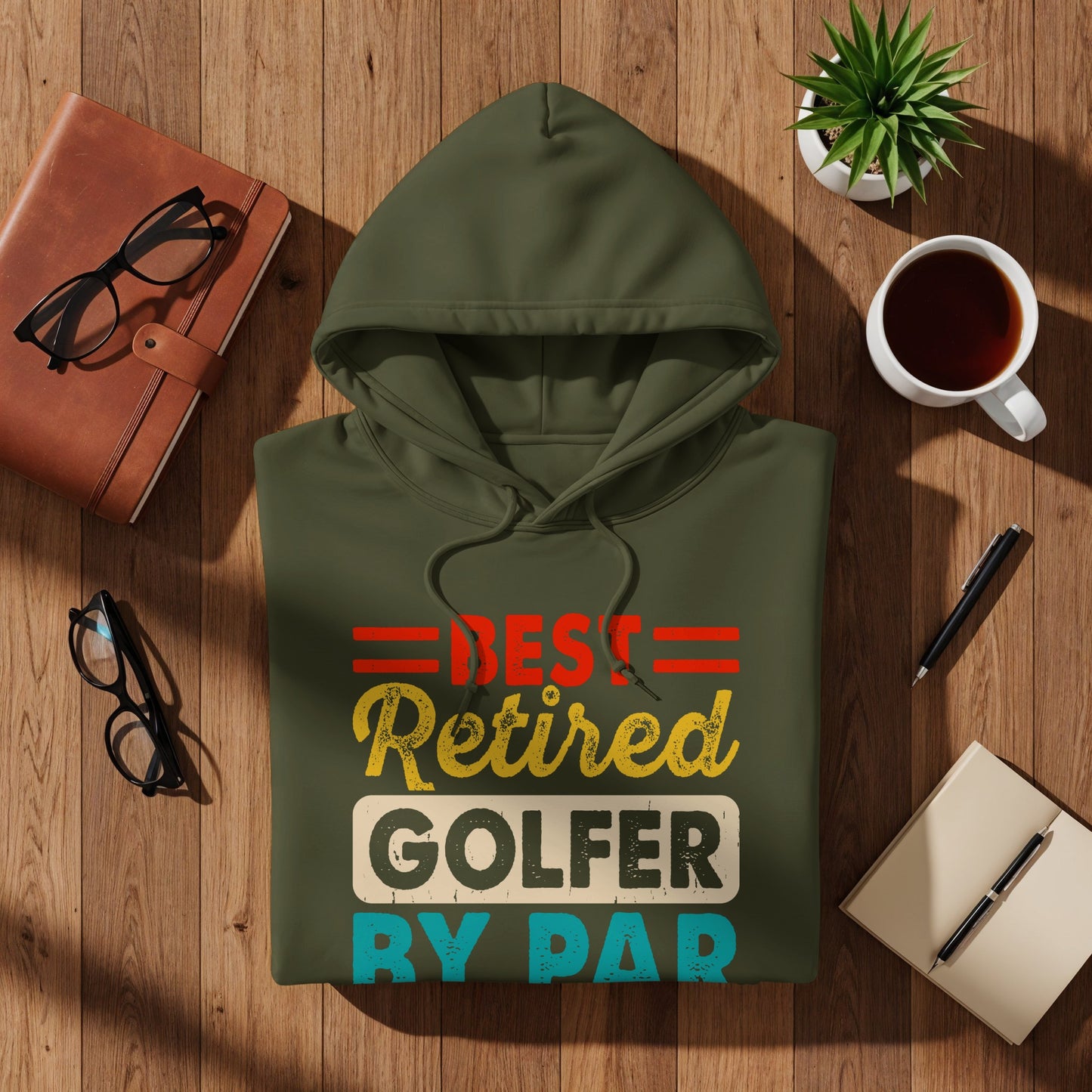 Olive green hoodie with "BEST RETIRED GOLFER BY PAR" text.
