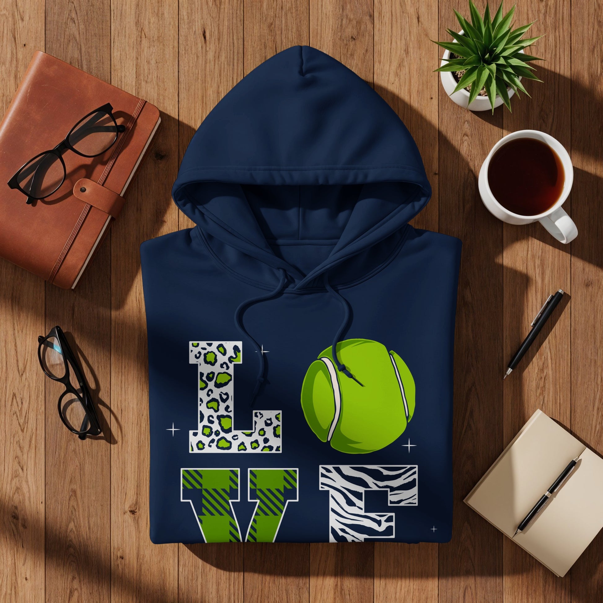 Navy blue hoodie with "LOVE" graphic featuring a tennis ball.