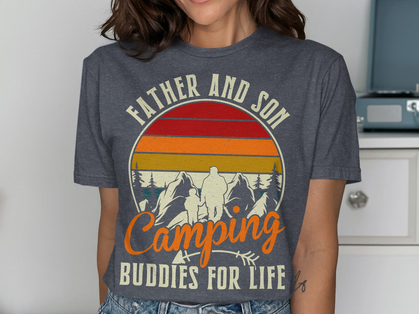 Faded t-shirt with "Father and Son Camping Buddies for Life" text and mountains graphic.