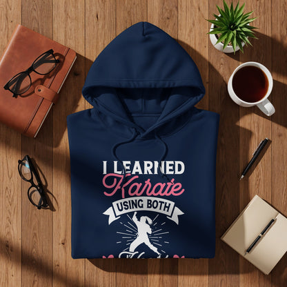 Navy hoodie with white and pink text and graphic about karate.