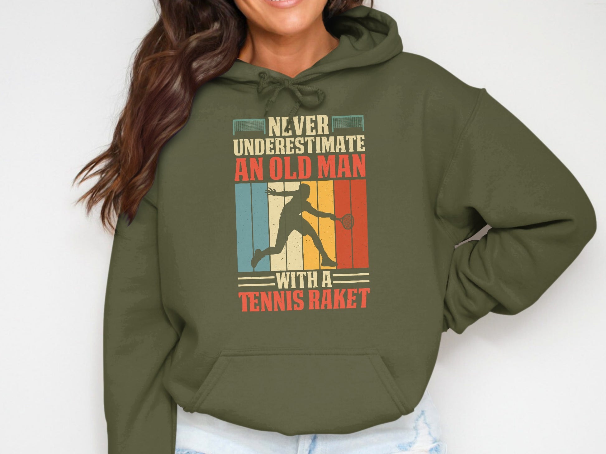 Olive green hoodie with "Never underestimate an old man with a tennis racket" text.
