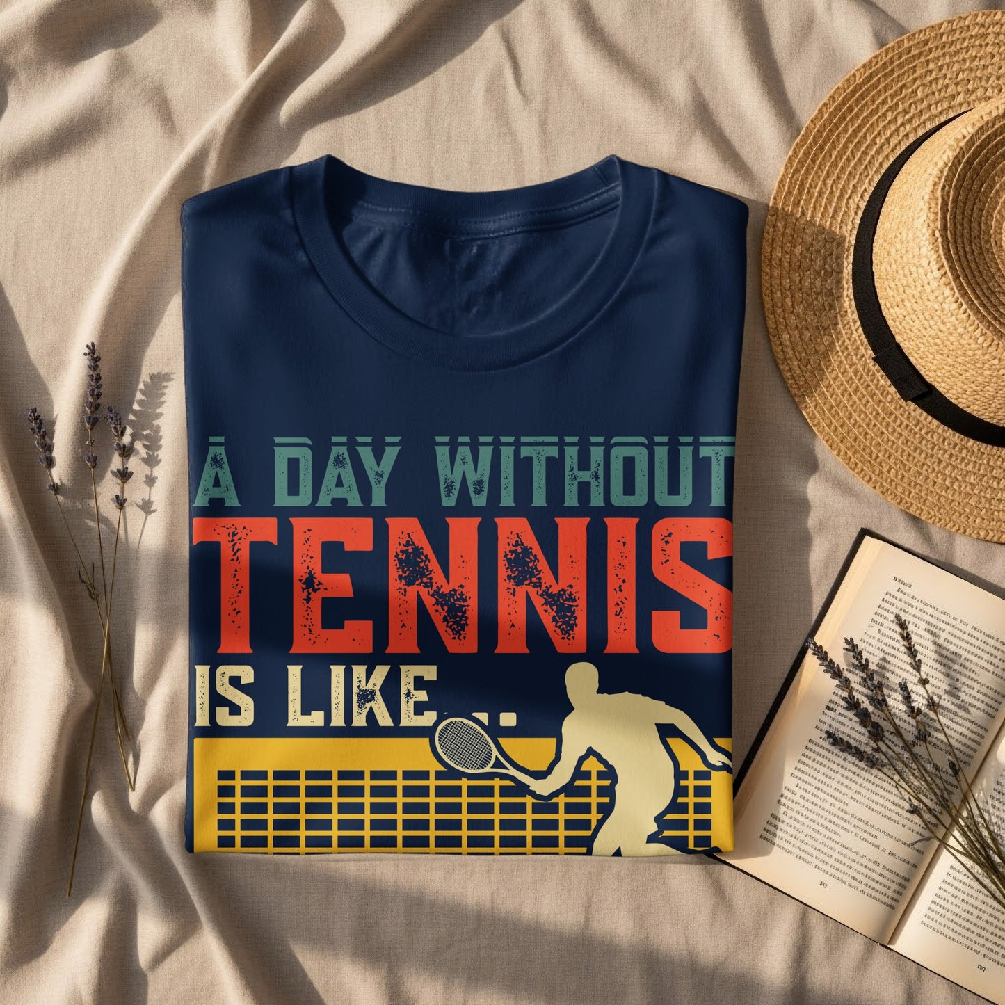 Navy t-shirt with "A DAY WITHOUT TENNIS IS LIKE" text and tennis player graphic.