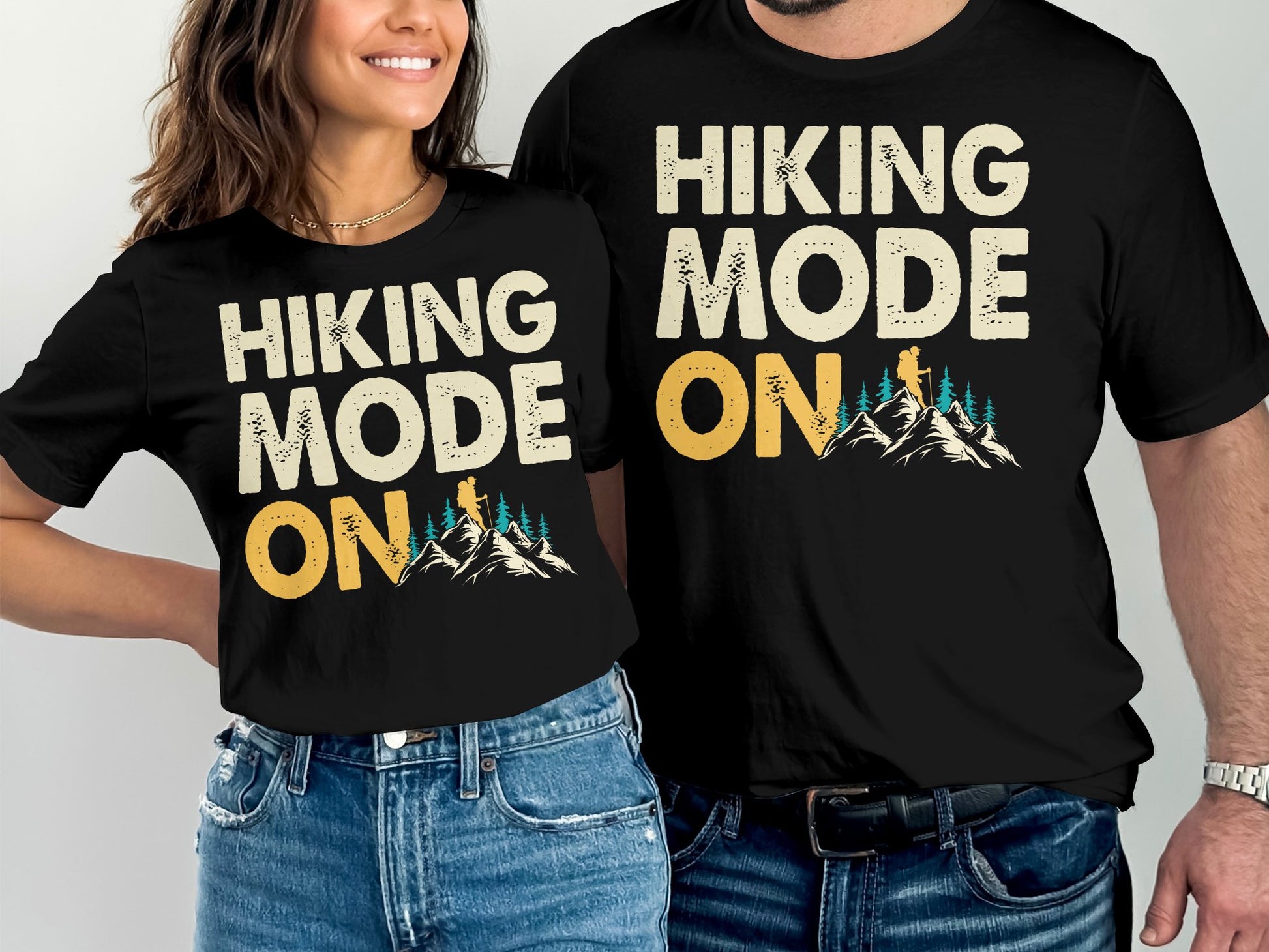 Matching t-shirts with "Hiking Mode On" text and mountain graphic.