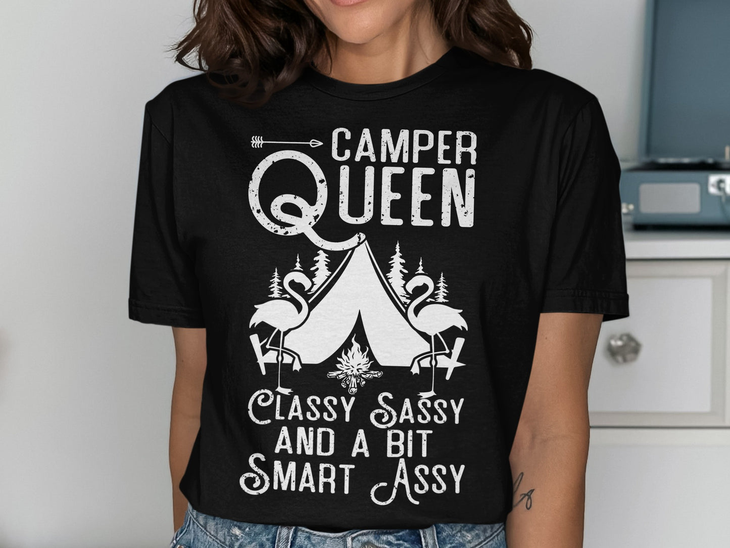 Black t-shirt with "Camper Queen" text and flamingo illustration.