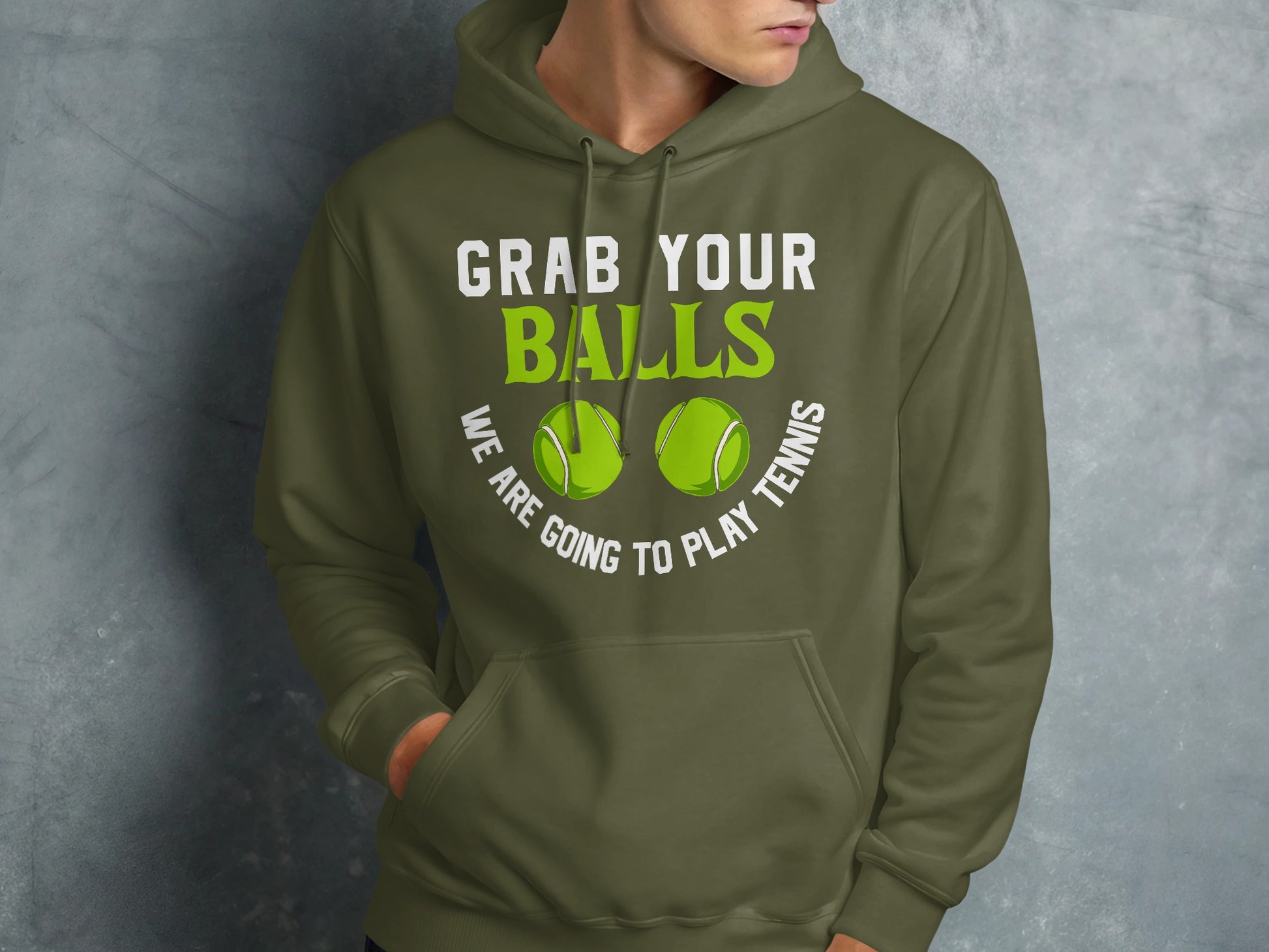 Olive green hoodie with "Grab your balls, we are going to play tennis" text.