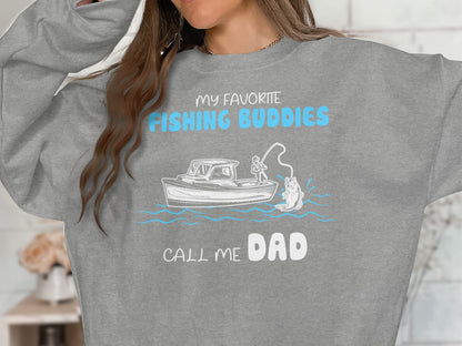 Gray sweatshirt with "My Favorite Fishing Buddies Call Me Dad" text and fishing graphic.