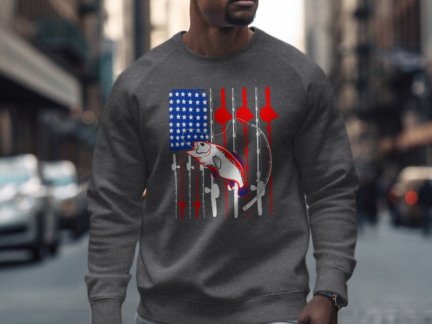 Man wearing gray sweatshirt with American flag and fishing rods graphic.