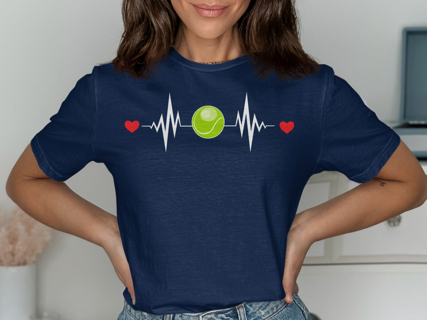 Navy t-shirt with tennis ball heartbeat design and red hearts.