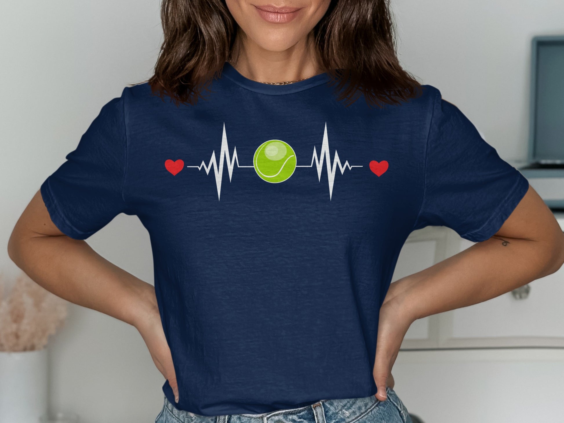 Navy t-shirt with tennis ball heartbeat design and red hearts.
