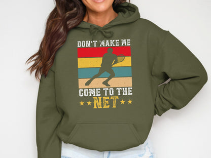 Olive green hoodie with vintage tennis player graphic and text "DON'T MAKE ME COME TO THE NET".