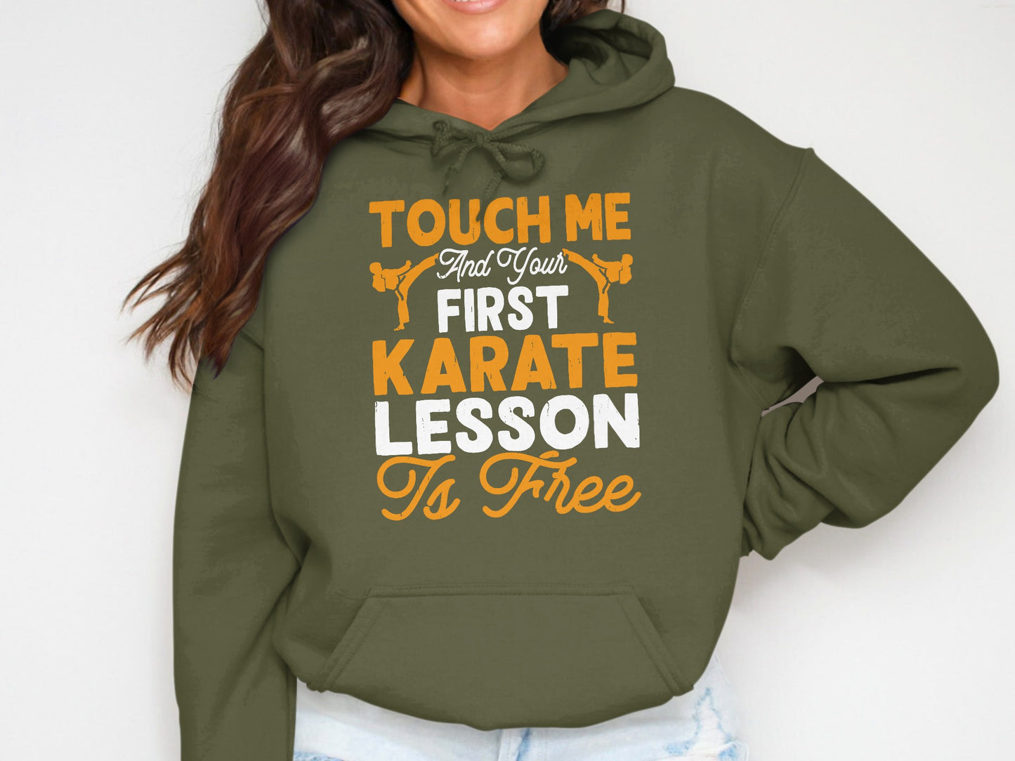 Olive green hoodie with "Touch Me And Your First Karate Lesson Is Free" text.