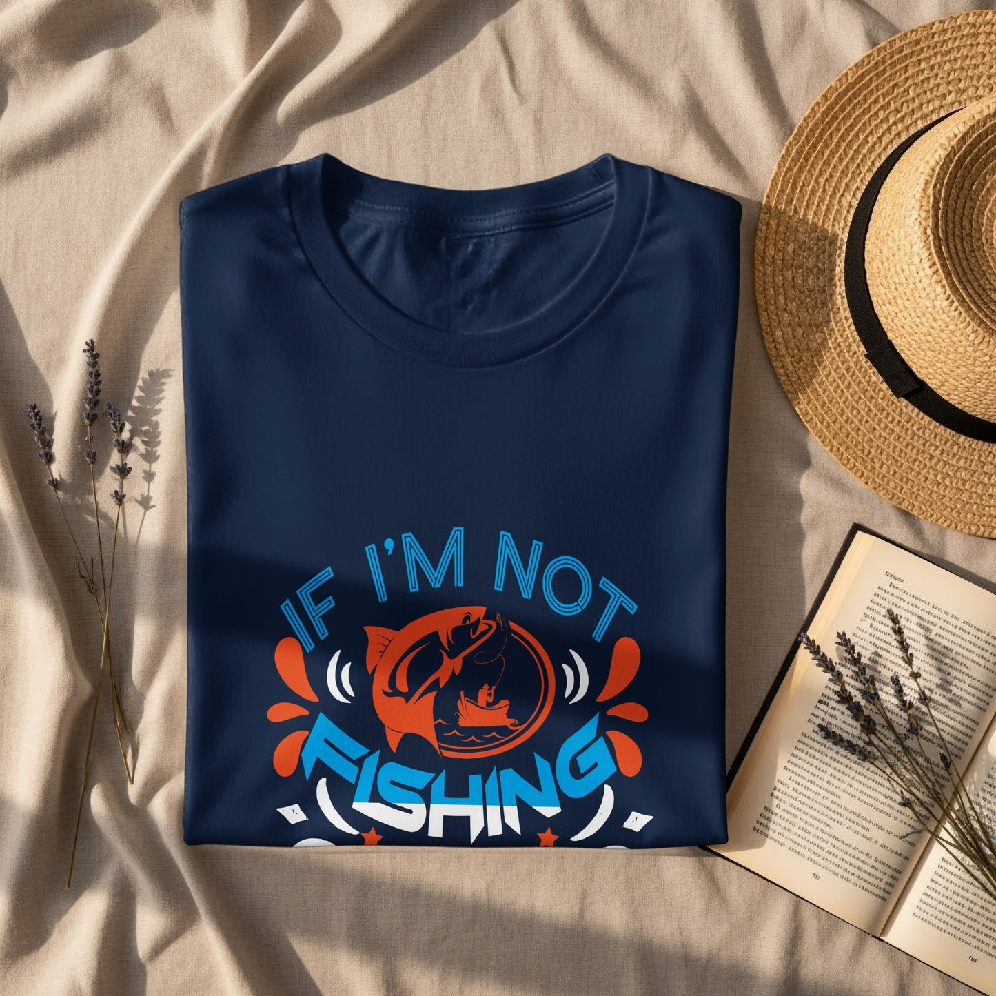 Navy t-shirt with "If I'm not fishing" text and fish graphic.