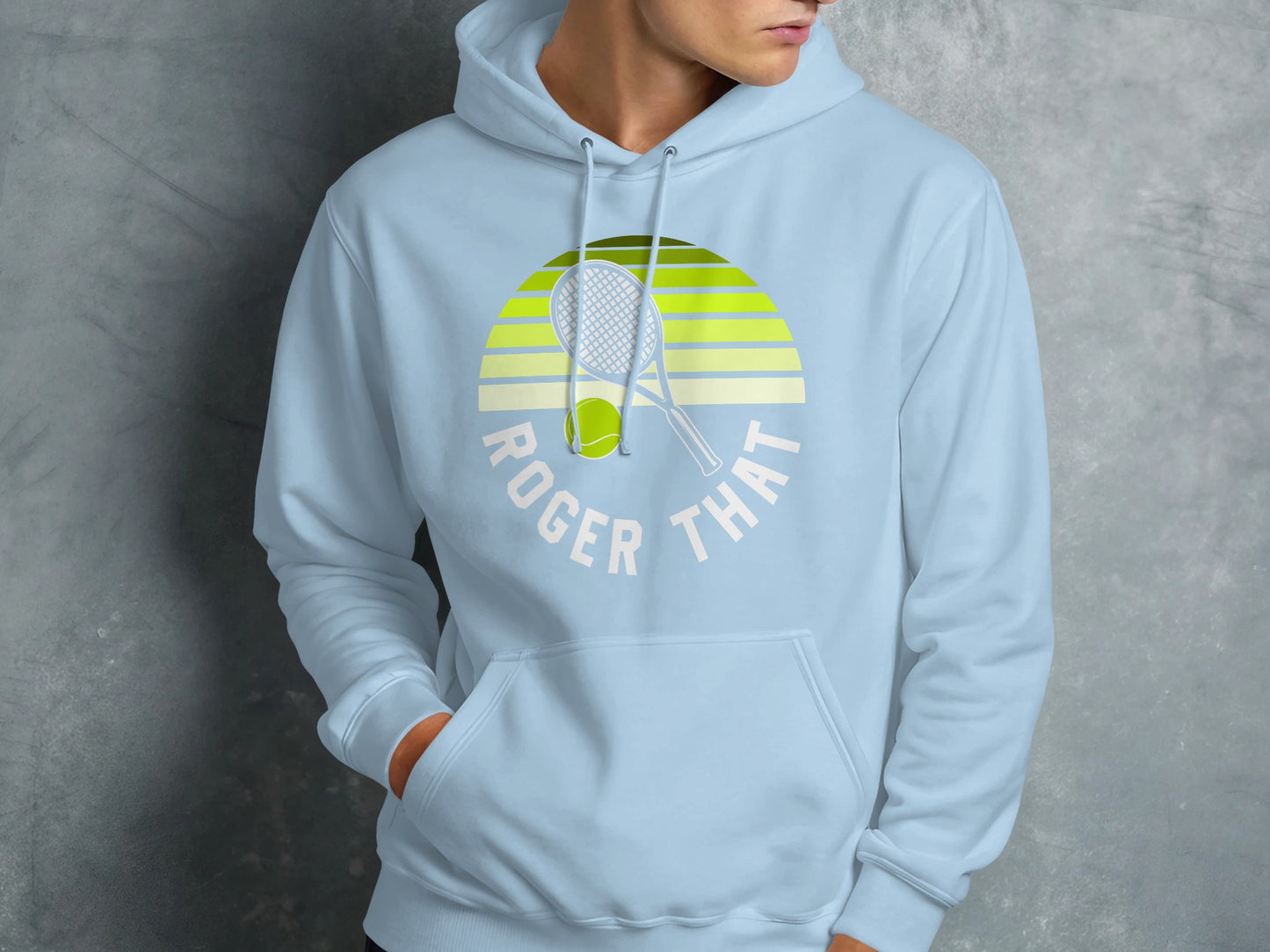Light blue hoodie with Roger That tennis graphic and racket.