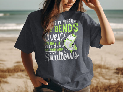 T-shirt with text "I love it when she tugs on my worm and swallows."