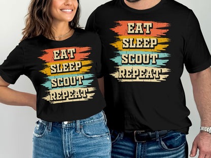 T-shirts with "Eat Sleep Scout Repeat" text in colorful, distressed stripes.