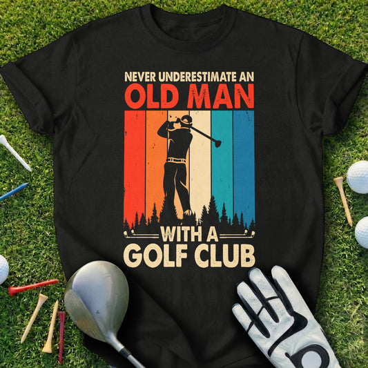 Black t-shirt with "Never underestimate an old man with a golf club" text and golfer graphic.