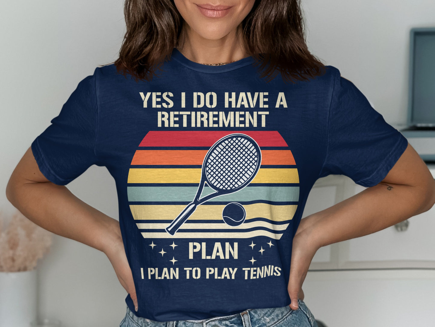 Navy t-shirt with "YES I DO HAVE A RETIREMENT PLAN I PLAN TO PLAY TENNIS" and tennis graphic.