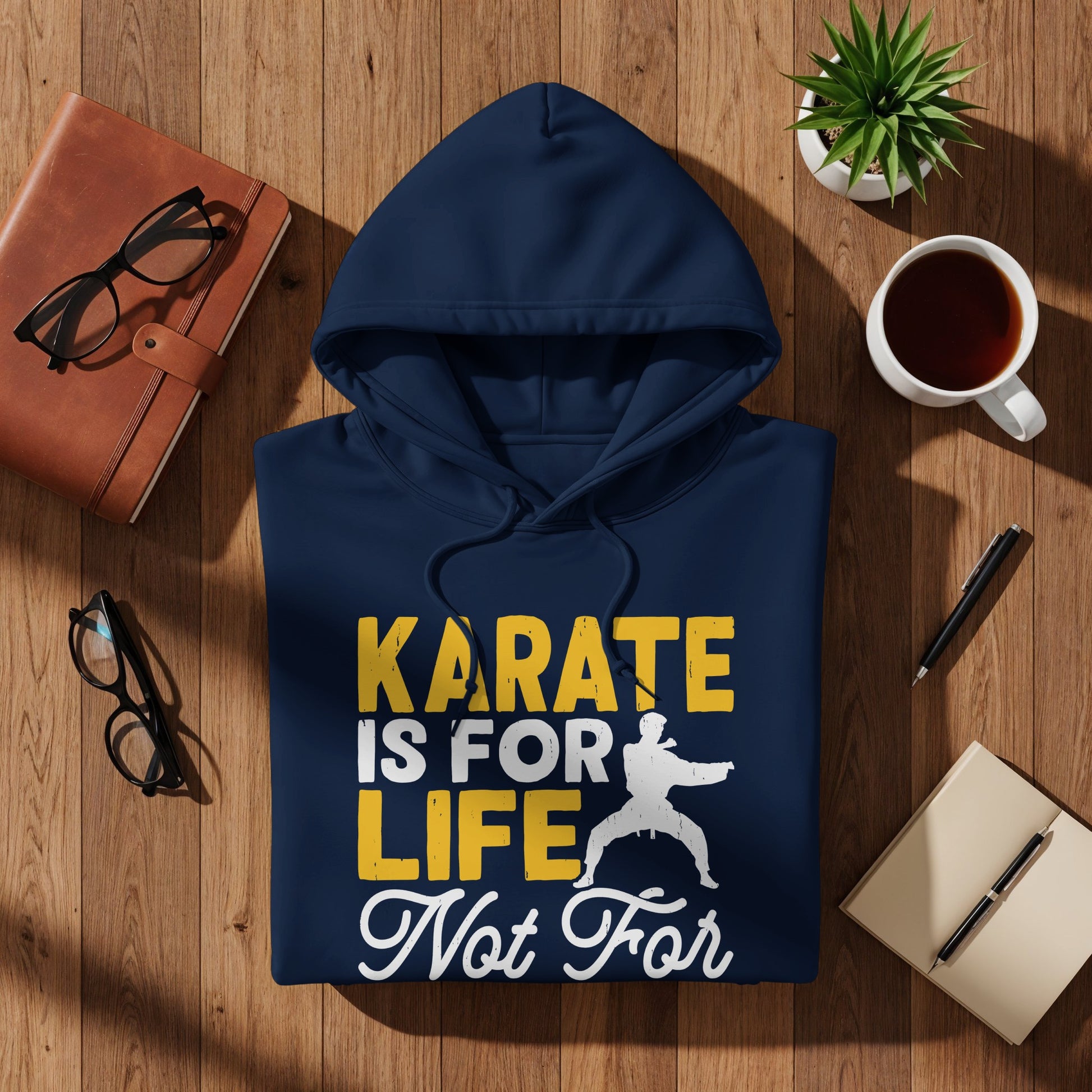 Navy blue hoodie with "Karate is for Life Not For" text and a martial artist graphic.