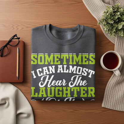 Dark grey sweatshirt with "Sometimes I Can Almost Hear The Laughter" text.