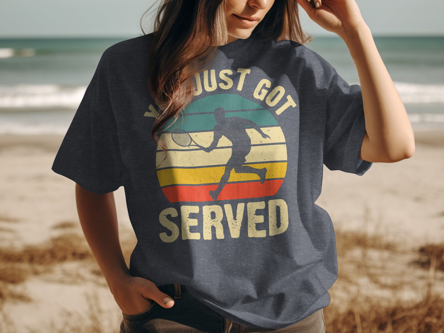 Tennis t-shirt with "Just Got Served" text and retro sunset design.