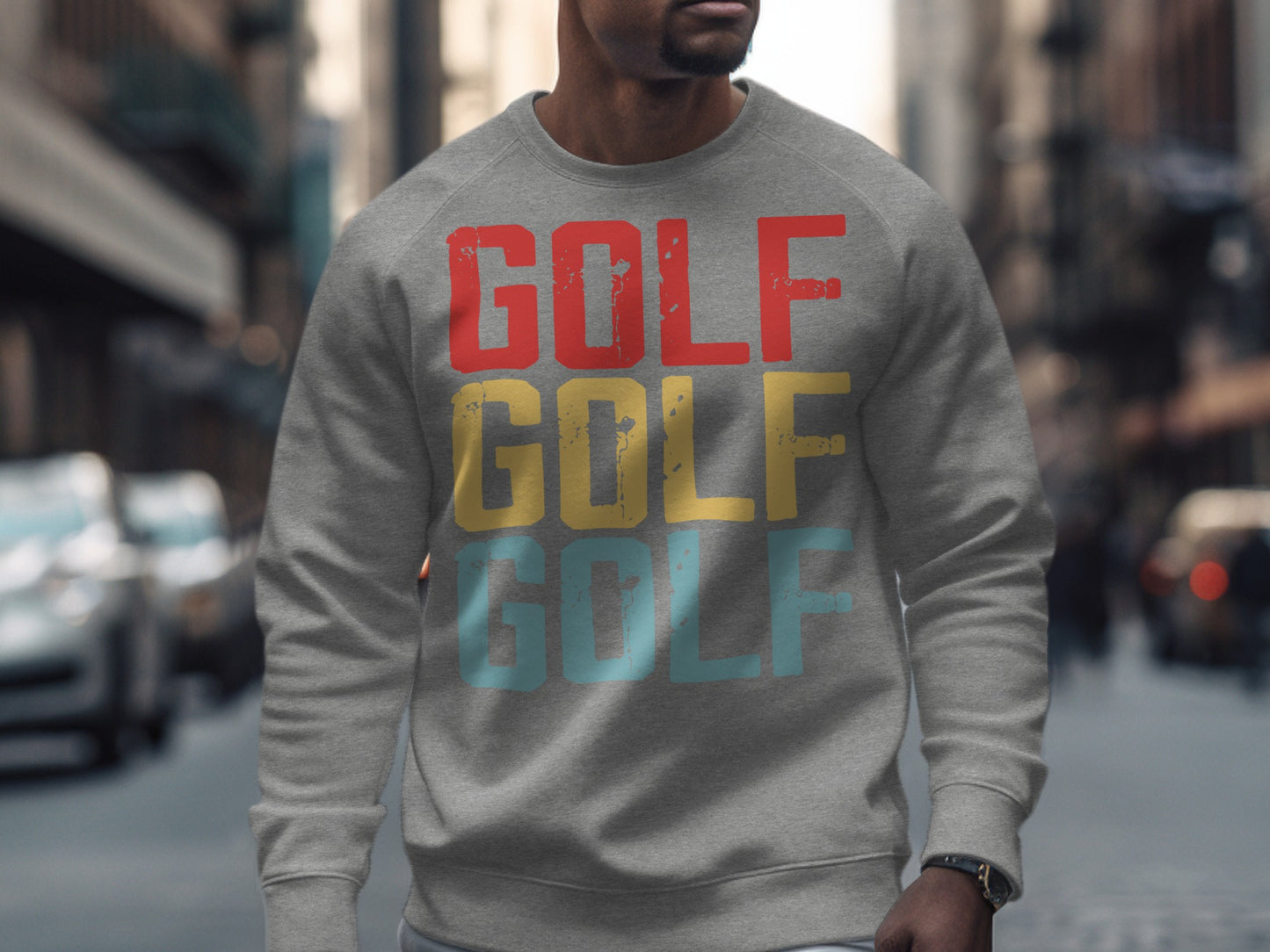 Gray sweatshirt with "GOLF" in red, yellow, and blue block letters.
