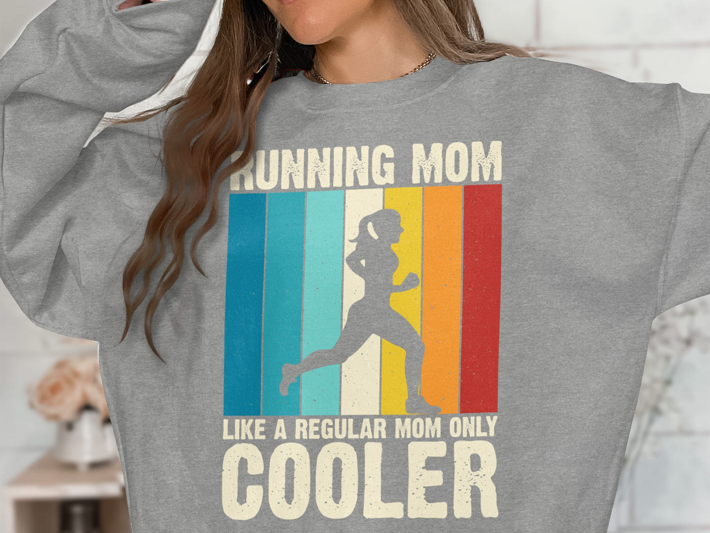 Gray sweatshirt with "Running Mom Like A Regular Mom Only Cooler" text and runner graphic.