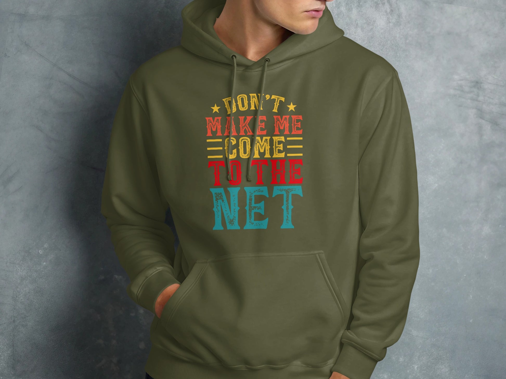 Green hoodie with "Don't Make Me Come To The Net" text.
