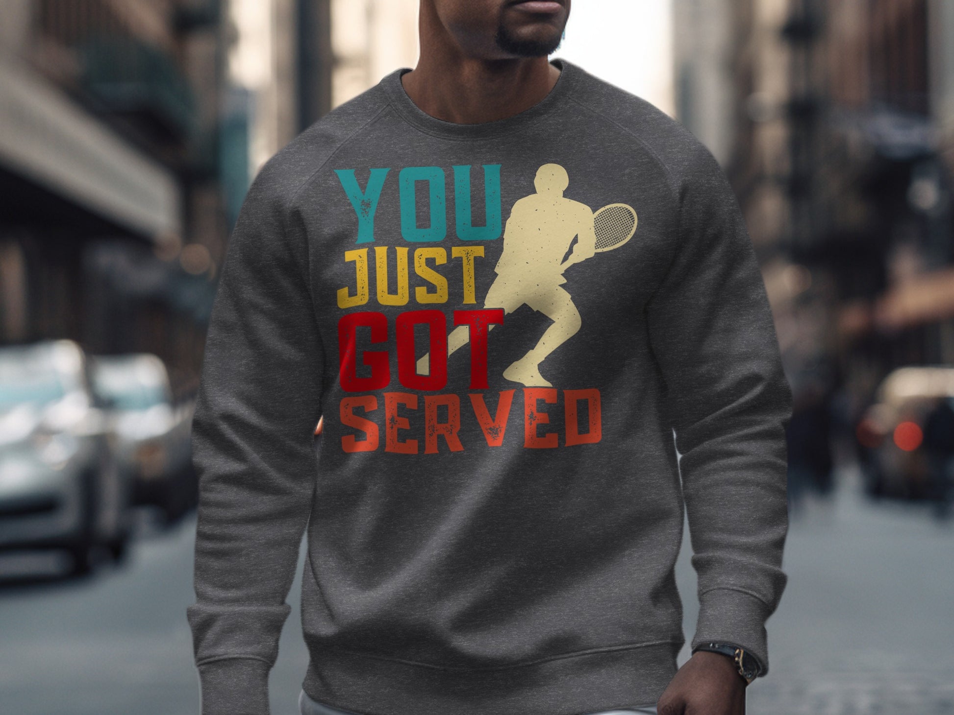 Gray sweatshirt with "YOU JUST GOT SERVED" and tennis player graphic.