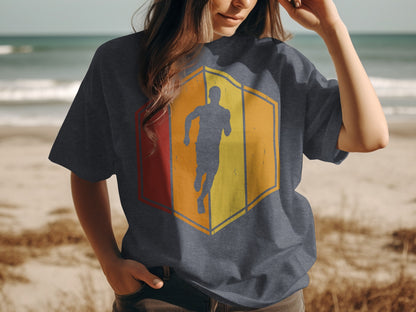 Dark blue t-shirt with a hexagonal graphic of a runner in red, orange, and yellow.