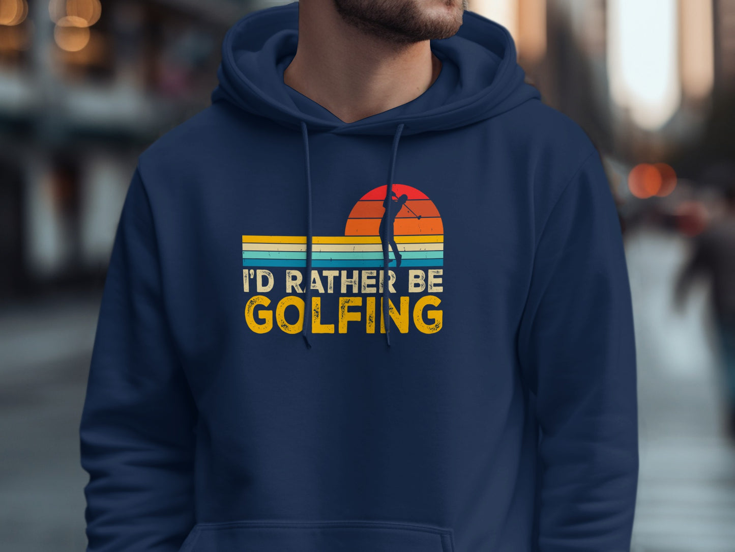 Navy hoodie with "I'd rather be golfing" text and sunset golf silhouette graphic.