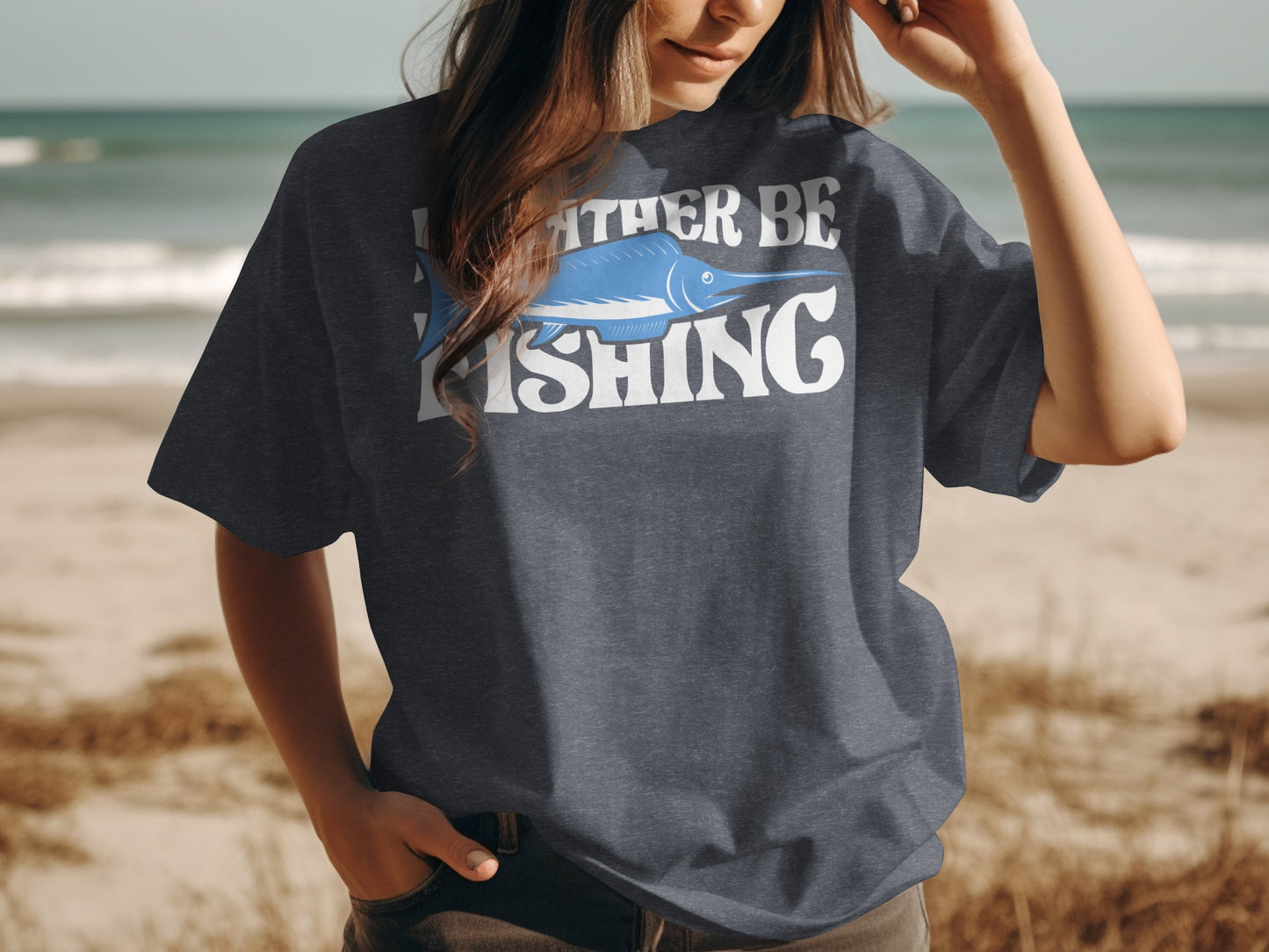 Woman wearing a dark t-shirt with "Rather be Fishing" and a marlin graphic.