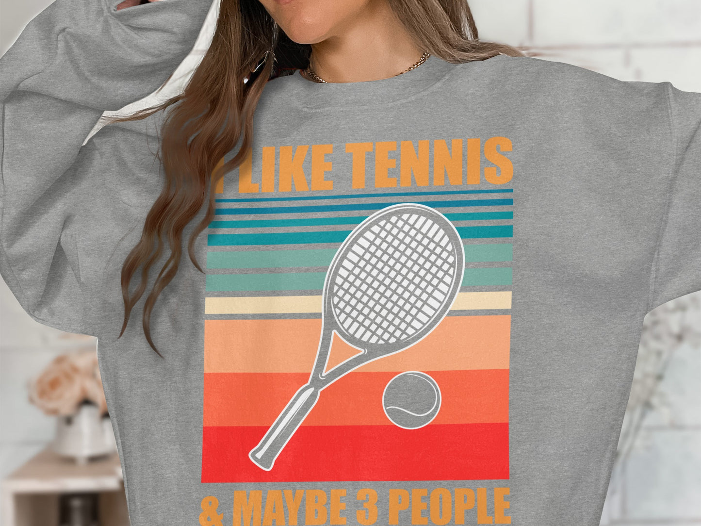 Grey sweatshirt with "I LIKE TENNIS" and tennis racket graphic.