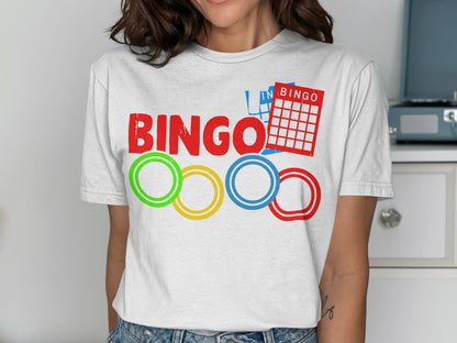 Red, green, yellow, and blue bingo rings below a bingo card and the word "BINGO".