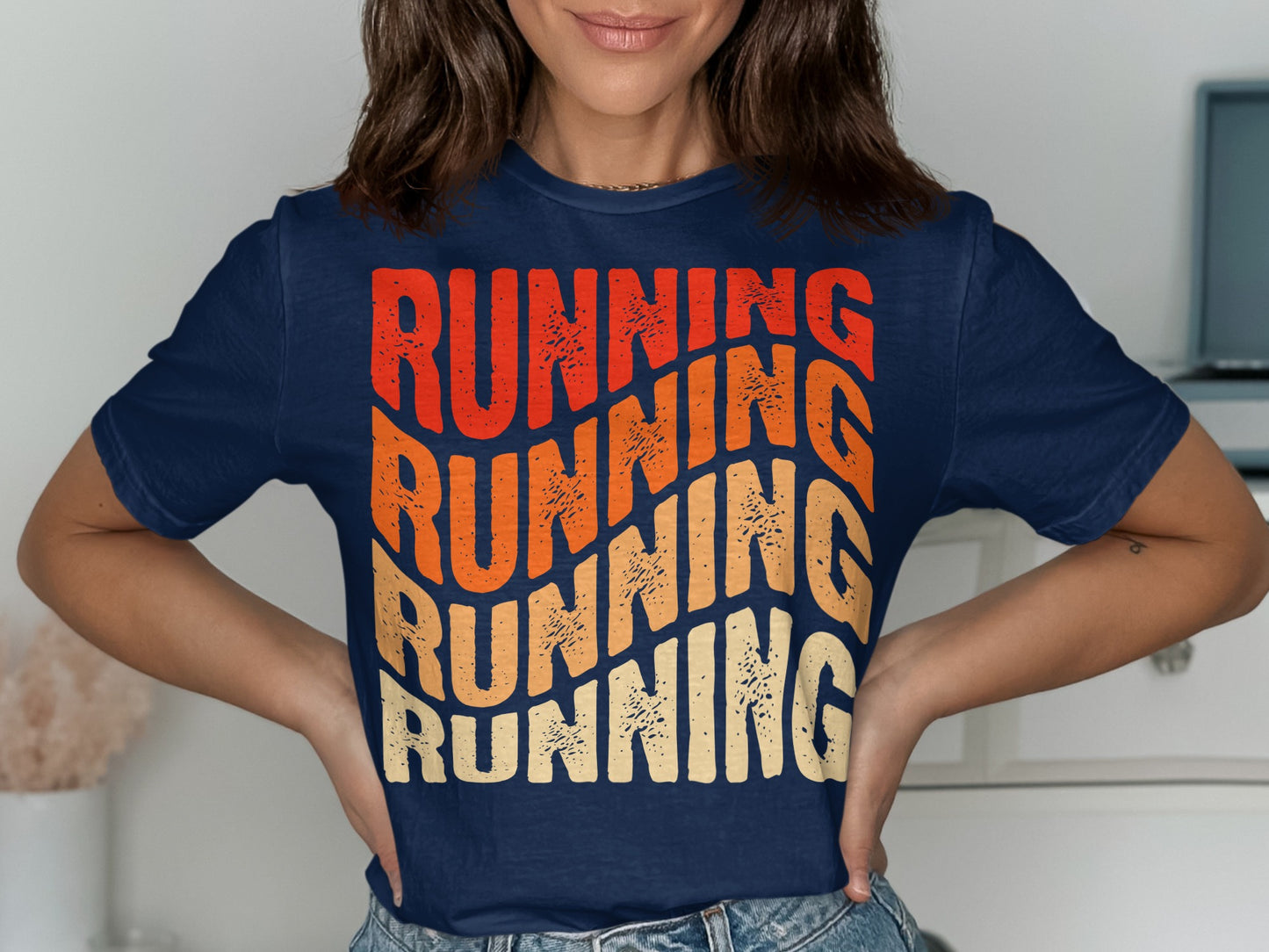 Navy t-shirt with "RUNNING" in stacked, distressed lettering of orange and yellow.
