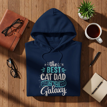 Navy hoodie with "The Best Cat Dad In The Galaxy" text design.