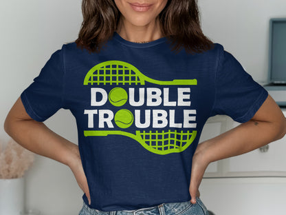 Navy t-shirt with green tennis rackets and "DOUBLE TROUBLE" text.