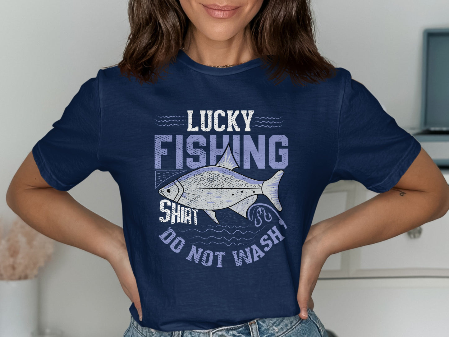 Navy t-shirt with "Lucky Fishing Shirt Do Not Wash" text and fish graphic.